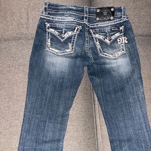 Size 27x32 Miss Me boot cut jeans. Excellent condition.